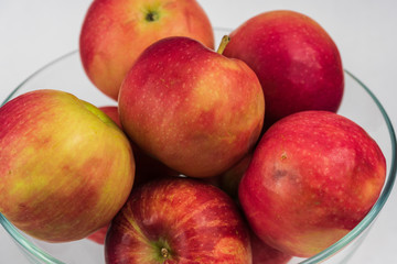 Apples in a glass bowl. 