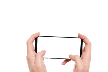 Man hands playing on the black smartphone blank screen with modern frameless design isolated on...
