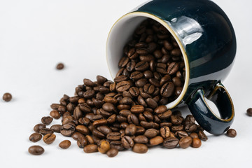 Coffee beans in coffee cup. 