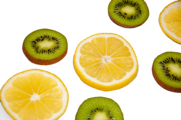 Fototapeta premium Kiwi and lemon circles on a white background