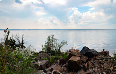 stones by the pond, beautiful summer landscape