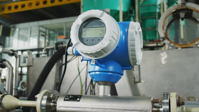 pressure meter with screen on equipment in plant workshop