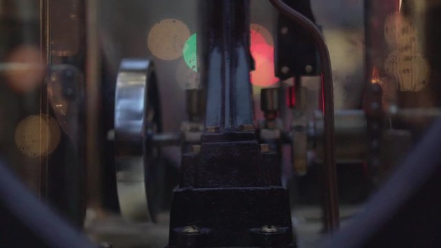 This was taken at a higher frame rate and has been converted to a slow motion video clip. Slow motion of a steam clock, inside the clock.