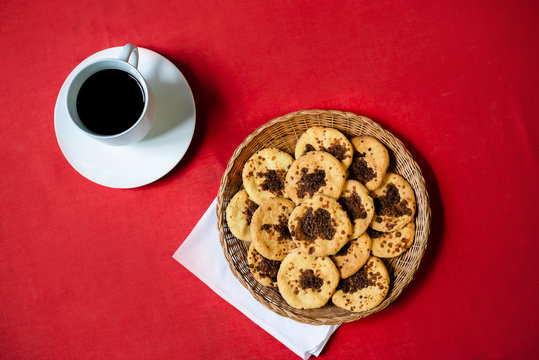 Traditional Nicaraguan "Viejitas" served in a palm basket with black coffee in an white cup. No people.