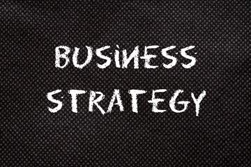 Black background of pattern texture with business strategy words