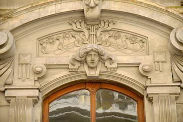 Carved male head figure in Liberty style entrance way,over door entrance in Trieste Italy