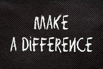 Black background of pattern texture with make a difference words