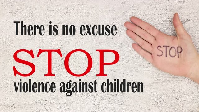 Stop violence against children motivation quote and hand with stop written - Stop motion 