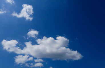 Blue sky clearly background with clouds