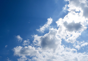 Blue sky clearly background with clouds