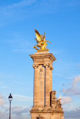 Fototapeta premium Column with sculpture of pond Alexandre in Paris