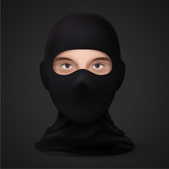 Mask on the Face Balaclava Snowboarding or Mountain Skiing Protective Wear on Black Backdrop. Symbol of Hacker or a Criminal Person. Also Equipment for Special Forces or Winter Sports