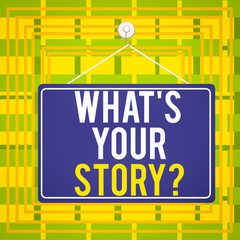 Fototapeta premium Text sign showing What S Is Your Story question. Business photo showcasing being asked by someone about my own journey from beginning till now Colored memo reminder empty board blank space attach