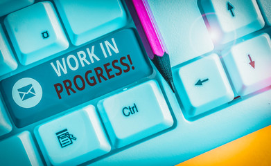 Writing note showing Work In Progress. Business concept for unfinished project that still added to...