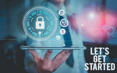 Conceptual hand writing showing Let S Is Get Started. Concept meaning to begin doing or working on something you had started Woman wear formal work present using smart latest device