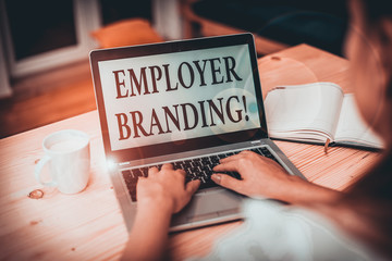 Word writing text Employer Branding. Business photo showcasing promoting company employer choice to desired target group woman laptop computer smartphone mug office supplies technological devices