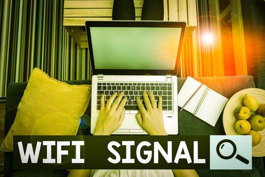 Text sign showing Wifi Signal. Business photo showcasing provide wireless highspeed Internet and network connections woman laptop computer office supplies technological devices inside home