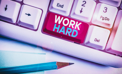 Handwriting text writing Work Hard. Conceptual photo Laboring that puts effort into doing and...