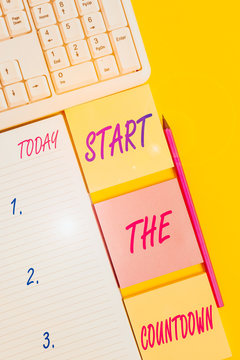 Text sign showing Start The Countdown. Business photo text Sequence of Backward Counting to Set the Timer Empty papers with copy space on the yellow background table