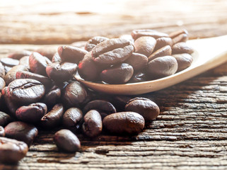 close up coffee beans on wooden table