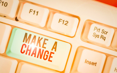 Writing note showing Make A Change. Business concept for Create a Difference Alteration Have an...