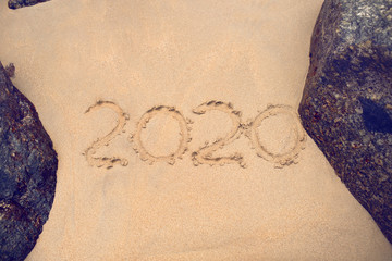 The inscription on the sand 2020 New Year!.