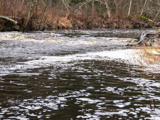 landscape with sandstone cliff and river