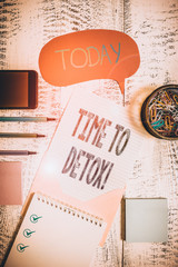 Text sign showing Time To Detox. Business photo showcasing when you purify your body of toxins or stop consuming drug Envelop speech bubble smartphone sheet pens spiral notepads clips wooden