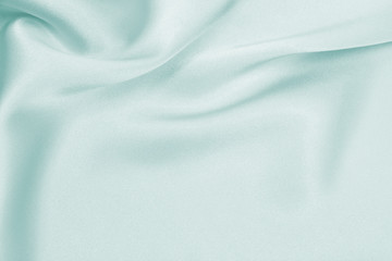 Draped satin blue fabric for festive backgrounds