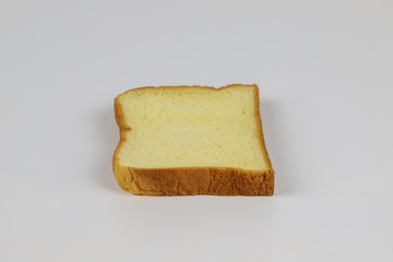 Sliced of yellow bread on white background