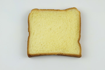 Sliced of yellow bread on white background