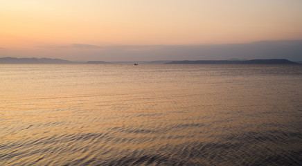 Beautiful sunset with clouds and sea.