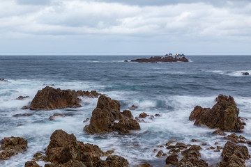 Shinto shrine in a stormy sea