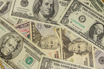 Background of different us dollar banknotes