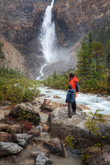 Mother and son hiking near Takakkaw Falls, Yoho National Park, British Columbia.