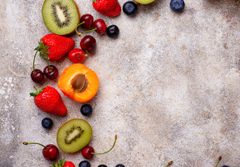 Naklejka na ściany i meble Fruits and berries summer background