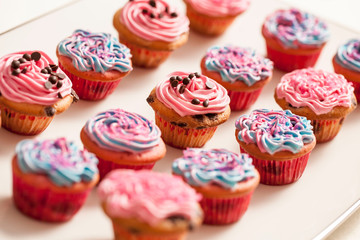 Cupcakes decorated with cream and sugar