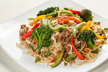 Italian spaghetti with vegetables closeup