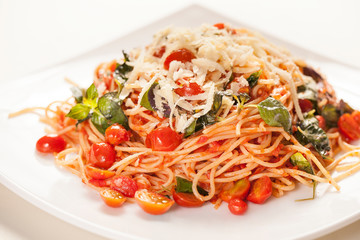 Italian spaghetti with vegetables closeup