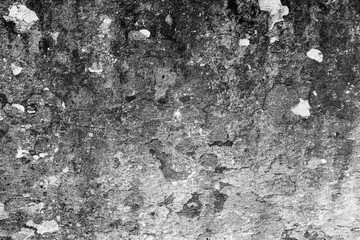 Texture of a concrete wall with cracks and scratches which can be used as a background