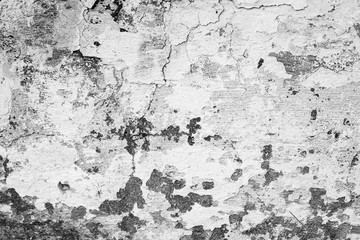 Texture of a concrete wall with cracks and scratches which can be used as a background