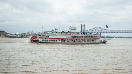 Typical Missisippi paddle wheel streamer in New Orleans during daytime - obrazy, fototapety, plakaty