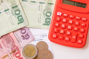 Thailand Baht, Chinese Yuan, US Dollar banknotes and Thailand Baht coin. calculation amount of money.
