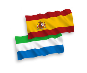 Flags of Sierra Leone and Spain on a white background