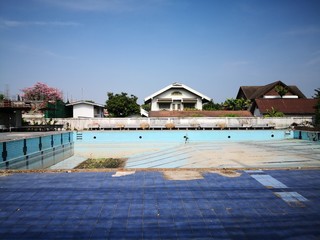 old dirty pool with no water