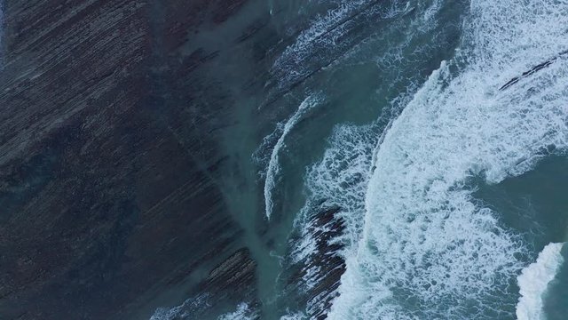 Zumaia and Deba flysch geological strata layers drone aerial view, Basque Country