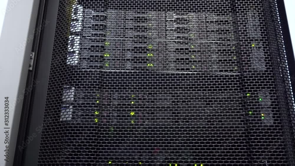 Poster data servers rack with many hard drives. view in motion. hdd.