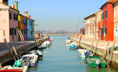 Fototapeta na wymiar Murano, burano , venetian island in Italy- colored house and canal