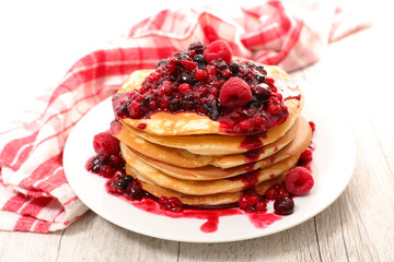 stack of pancake with berry fruit