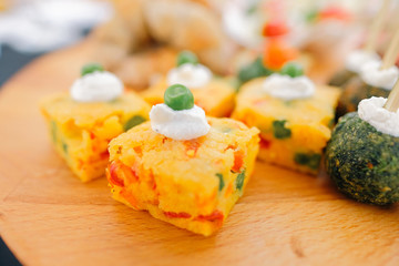Canape close up. Preparing and serving canapes at the event.